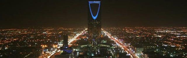 Image:  Night view of Riyadh, by Ammar Shaker via Wikimedia Commons.