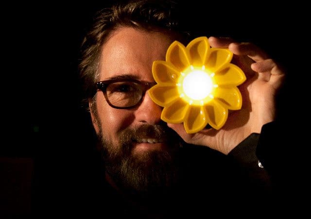 Olafur Eliasson with the Little Sun lamp