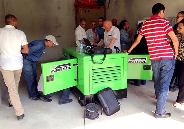 Ing. Hakan Ericsson sending programmes from laptop to control panel of a generator set